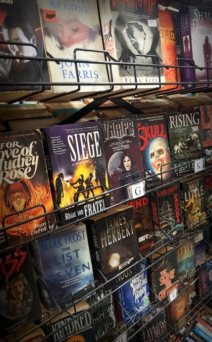 horror paperbacks on shelves